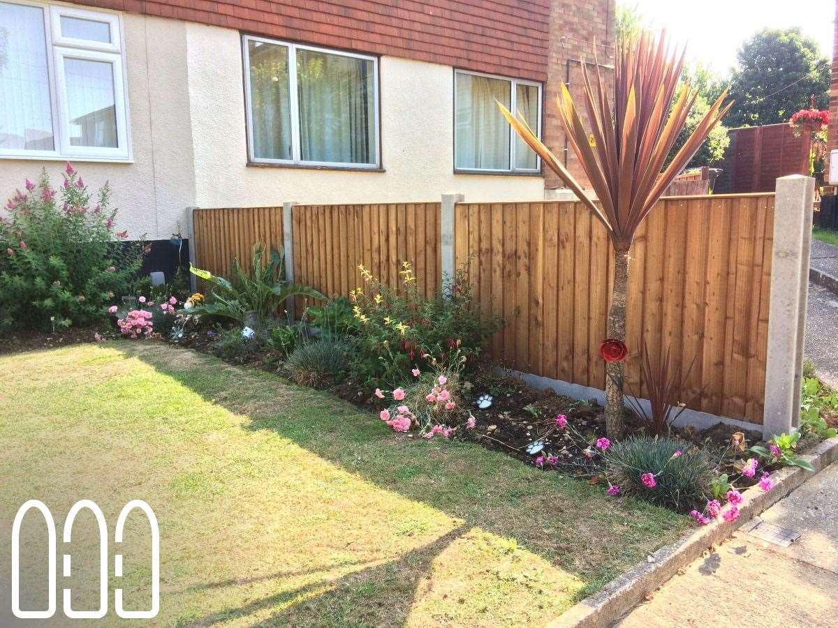 Close board fencing with concrete posts and gravel boards