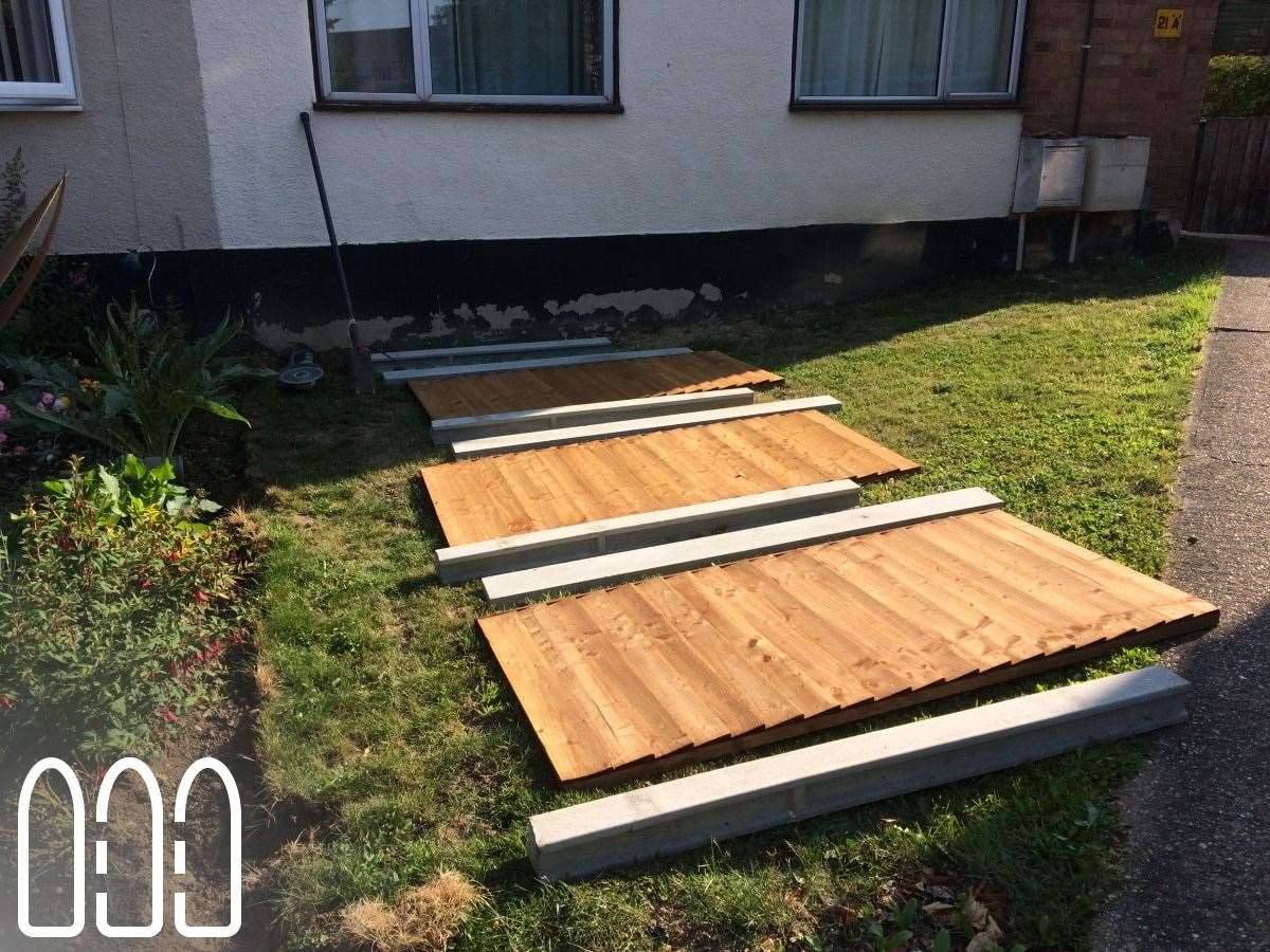 Close board fencing with concrete posts and gravel boards